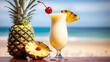 © SkyRoom Gallery - Exotic tropical drink with pineapple, closeup, blurred beach.