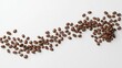 © Piya W. - Coffee beans scattered on a white background, perfect for coffee-related themes or culinary designs.
