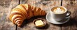 © SUNSU - Morning Delight: A golden croissant, a creamy latte, and a pat of butter on rustic wood create a scene of pure breakfast bliss.
