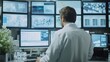 © Naturalis - Analyst Monitoring Multiple Screens in a Surveillance Control Room
