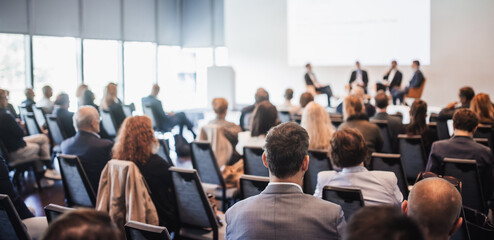 Wall Mural - interview and round table discussion at business convention and presentation. audience at the confer