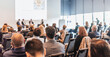 © kasto - Interview and round table discussion at business convention and presentation. Audience at the conference hall. Business and entrepreneurship symposium.