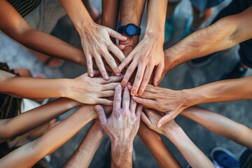 Poster - A diverse group of hands reaching towards the center in unity during an outdoor gathering, showcasing collaboration and togetherness in a warm and inviting environment