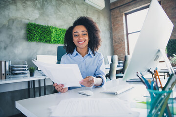 Wall Mural - Photo of adorable positive lady broker wear shirt reading documents working modern device indoors workplace workshop