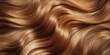 © David Zarzosa - Close up of flowing golden hair with smooth, wavy textures, showing rich shine and silky strands in natural light.