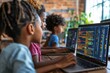 © Pooja - Over shoulder view at kids looking at laptop screen with computer programming chart during IT lesson, Generative AI
