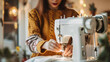 © Mirjana - Young woman sewing with a vintage sewing machine in a cozy, well-lit room filled with plants and warm decor during autumn