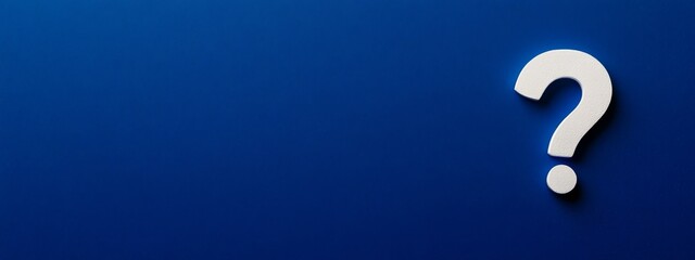 Wall Mural - a white question mark on the right side of an empty dark blue background