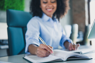 Sticker - Photo of adorable positive lady broker wear shirt writing book indoors workplace workshop