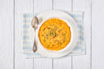 butternut squash puree with pumpkin seeds in bowl