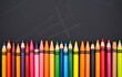 © TheseusStock - Colorful crayons on the blackboard, drawing. Back to school background.