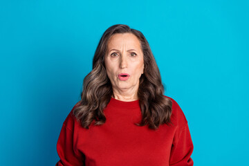 Wall Mural - Portrait of nice aged woman open mouth stare wear red sweater isolated on blue color background