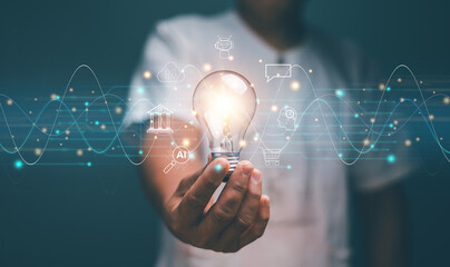 Poster - Business global internet connection application technology and digital marketing, Businessman holding glowing lightbulb with online application, Digital link tech, Big data, World information center.