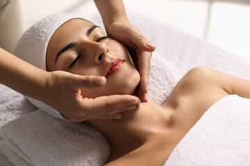 Canvas Print - Attractive woman enjoying face massage, closeup. Beauty procedure