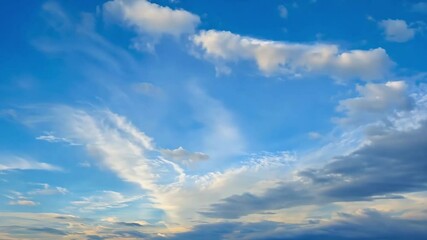 Wall Mural - Breathtaking cloud formations in the sky during sunset over the countryside