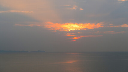 Wall Mural - beautiful view of golden sea and sky in the evening, natural background