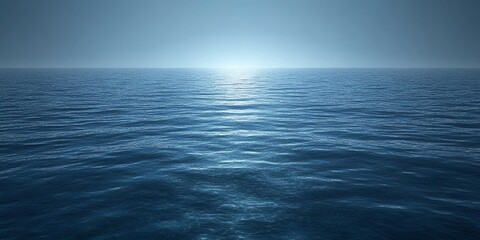 Canvas Print - Tranquil blue ocean with a soft glow of light in the distance.