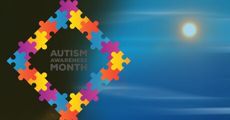 Poster - Autism awareness month text over jigsaw puzzle banner against blue background with copy space