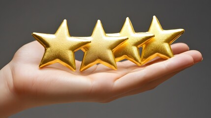 A hand gesture holding five golden star awards, representing success in business or the recognition of personal talent