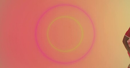 Poster - Animation of circles over african american footballer and football