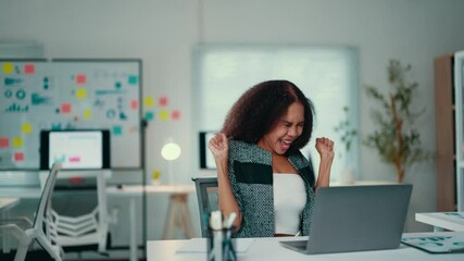 Poster - enthusiastic african american businesswoman is working at her desk. she experiences a range of emoti