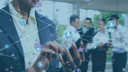 Poster - Animation of network of connections with icons over african american businesswoman using smartphone