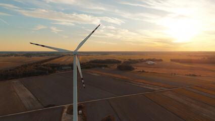 Wind turbine in rural green environment