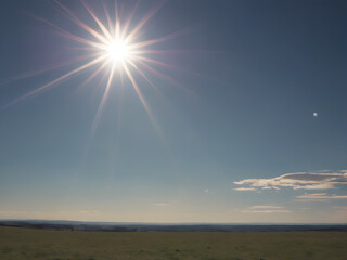 a bright, sunny sky with deep blue tones and the sun high in the sky, casting soft light across a pr