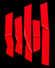 Wall Mural - Top view set of wrinkled red scotch tape or adhesive vinyl tape in stripes isolated on black background with clipping path