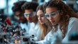 © Rajiv - Diverse Team of Multiethnic Young Scientists Passing Internship in a Modern High Tech Laboratory. Students Working in Advanced Lab with Science Equipment. Microchip Design and Electronics