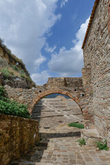 Sticker - A street between the old houses of Tursi in Basilicata, Italy.