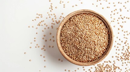 Wall Mural - A bowl of quinoa is sitting on a white background