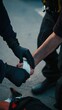 © Shozib - Paramedic wearing black gloves is bandaging a wounded hand
