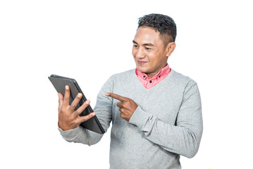 Cheerful expression of a man while holding a tablet isolated on a white background