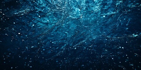 Poster - The image is of a body of water with a lot of white and blue specks