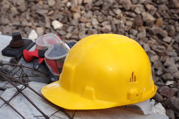 yellow helmet on a work site