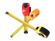 © New Africa - Different measuring tapes isolated on white. Construction tool