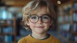 © ACE STEEL D - Portrait of a Young Boy Wearing Glasses in a Library