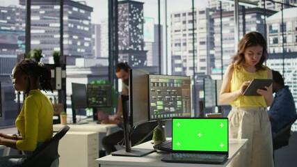 Poster - focus on chroma key laptop in workspace used by computer scientists doing software debugging. close 