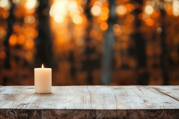 Poster - Burning candle illuminating empty rustic wooden table in autumn forest