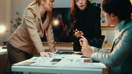 Poster - Business team is intensely discussing financial data, with one member expressing strong opinions while the others listen attentively