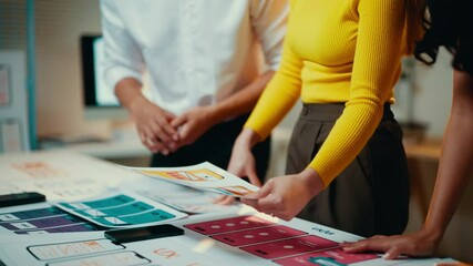 Poster - Team of software developers and ui/ux designers are collaborating on a new mobile application, reviewing wireframes and prototypes
