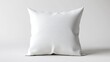 © Andrew - A mockup of a decorative throw pillow with a blank fabric surface, placed on a simple white background, suitable for home decor marketing