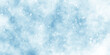 © DAIYAN MD TALHA - light blue bokeh background for design, Abstract blue background with snowflakes floating randomly, blue grunge texture with bokeh, beautiful blue watercolor background with glitter particles.