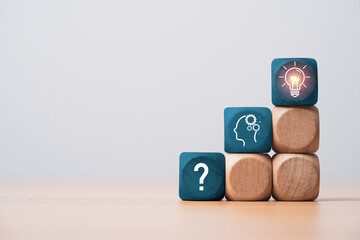 Poster - Question mark human thinking and glowing lightbulb icon print screen on wooden block cube for problem solving solution and creative thinking idea concept.