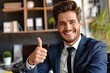 © eartist85 - Confident smiling businessman showing thumb up gesture.