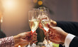 © peopleimages.com - Hands, group and toast champagne at party in celebration, goals or connection for success in career at night. Business people, drinks and alcohol for cheers, congratulations or new year at gala event