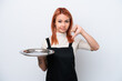 © luismolinero - Young Russian waiter with tray isolated on white background showing thumb down with negative expression
