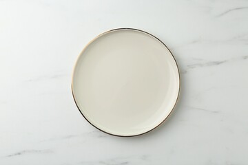 Stylish plate on white marble table, top view