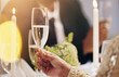 © peopleimages.com - Alcohol, champagne and hands of people at party for celebration, social event and gathering. Friends, luxury restaurant and closeup of liquor for cheers, toast and drinks at new years eve gala